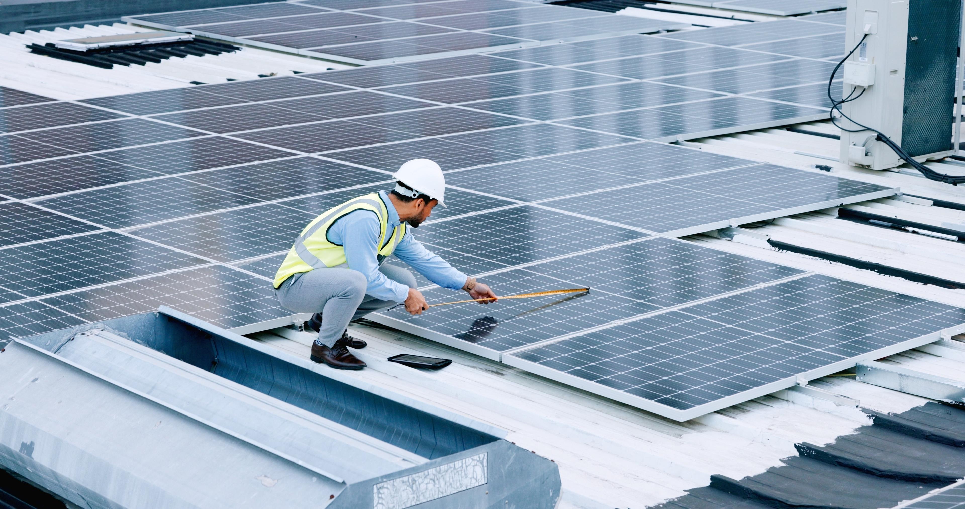 Polaron’s commercial solar energy system project is showcased on a screen of laptop.
