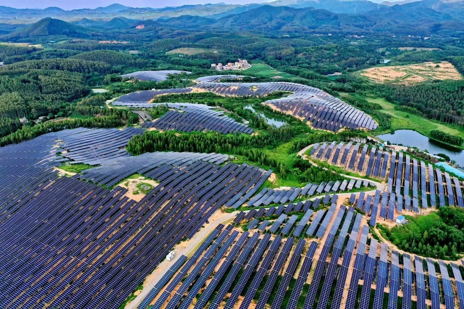 Rooftop solar panels capturing sunlight, contributing to eco-friendly energy solutions.